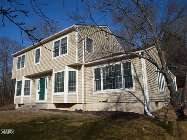53 Walnut Hill Road Bethel, CT 06801 - Photo 1 of 1 a house with trees in the background
