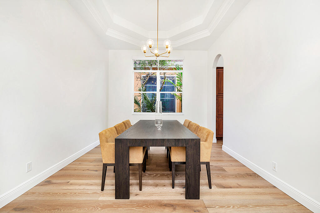 317 Galicia Way Jupiter, FL 33458 - Photo 17 of 31 a dining room with furniture and window