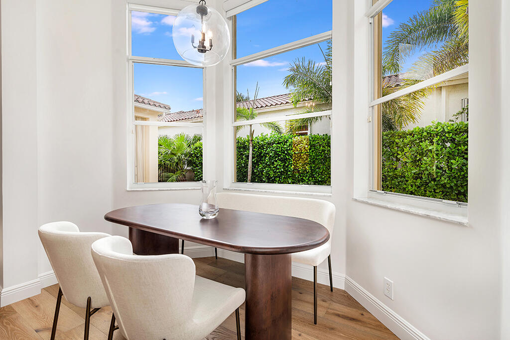 317 Galicia Way Jupiter, FL 33458 - Photo 21 of 31 a dining room with furniture and window