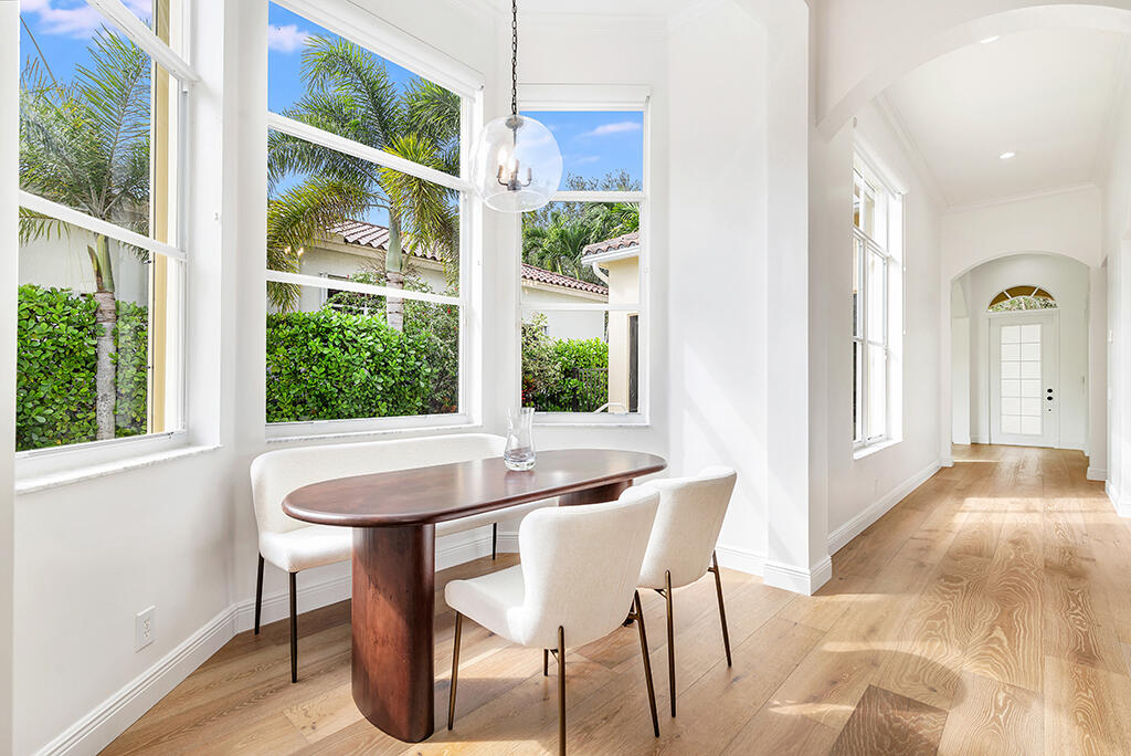 317 Galicia Way Jupiter, FL 33458 - Photo 9 of 31 a dining room with furniture and window