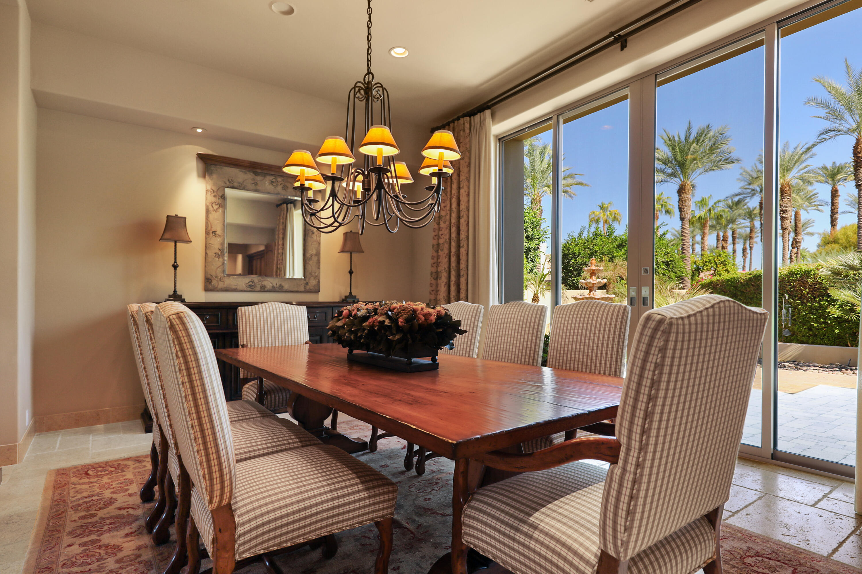 50360 Woodmere La Quinta, CA 92253 - Photo 13 of 56 a view of a dining room with furniture wooden floor and chandelier