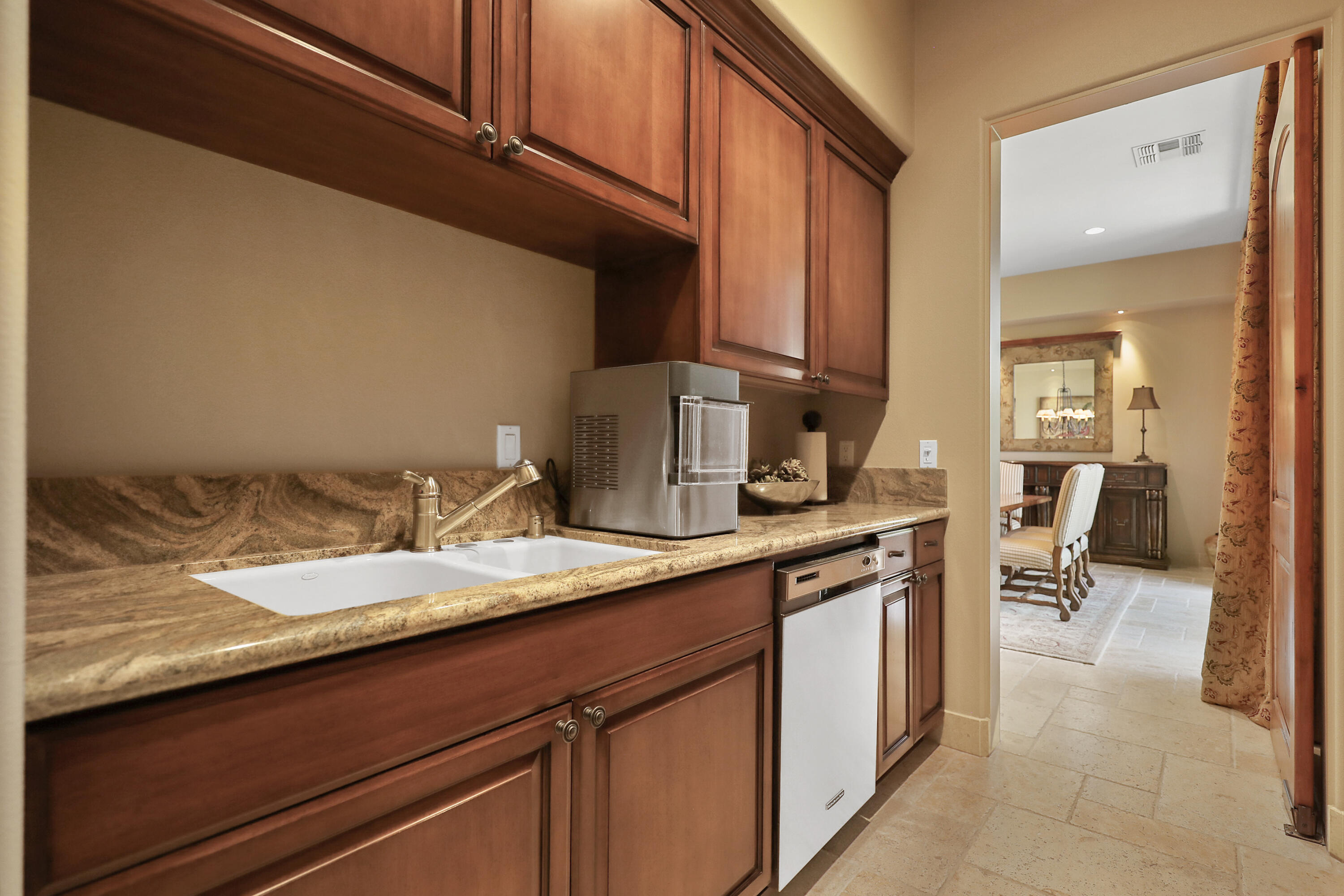 50360 Woodmere La Quinta, CA 92253 - Photo 14 of 56 a kitchen with a sink and cabinets