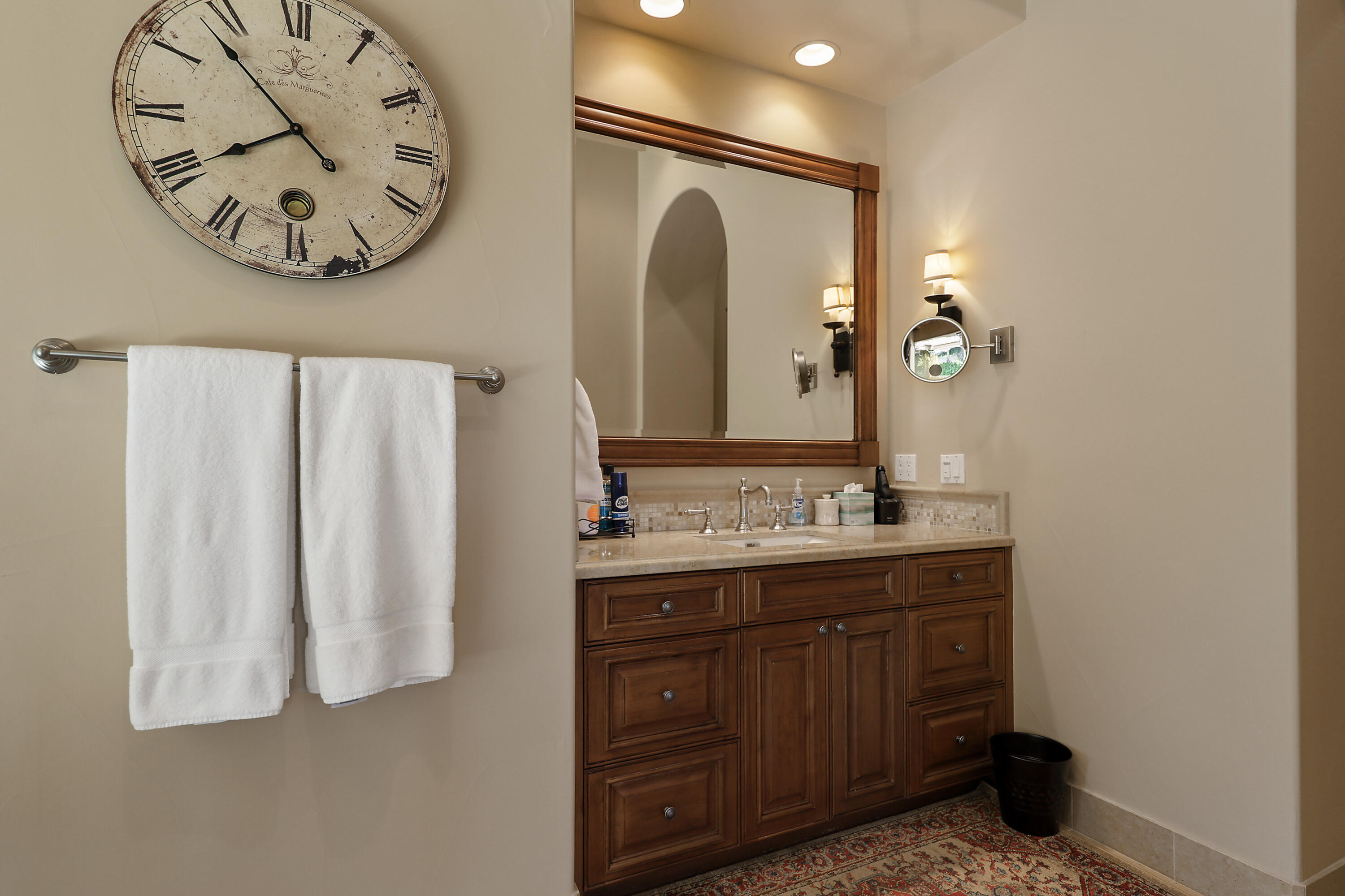 50360 Woodmere La Quinta, CA 92253 - Photo 26 of 56 a bathroom with a double vanity sink and a mirror