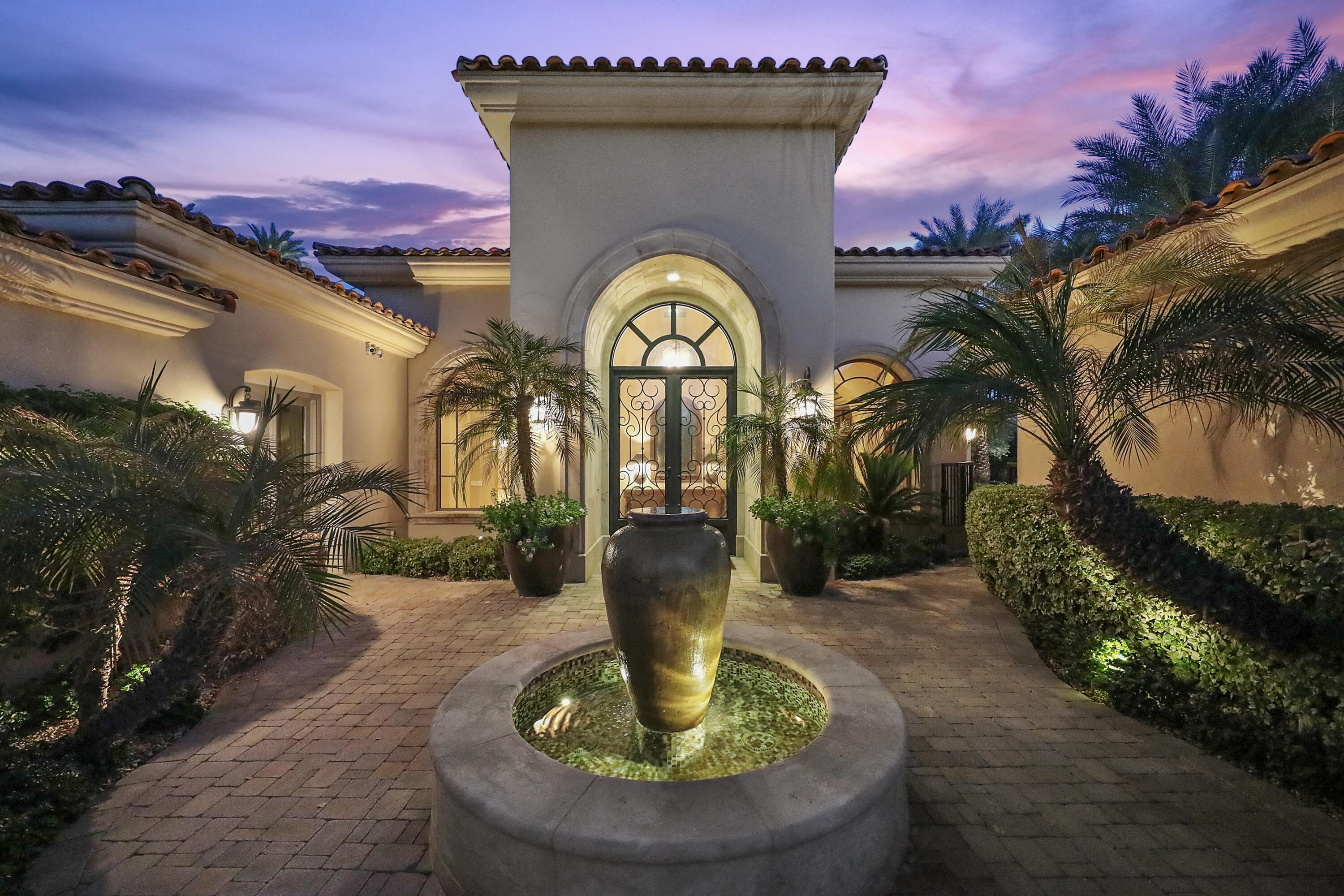50360 Woodmere La Quinta, CA 92253 - Photo 3 of 56 a view of a house with fountain bath tub and fire pit