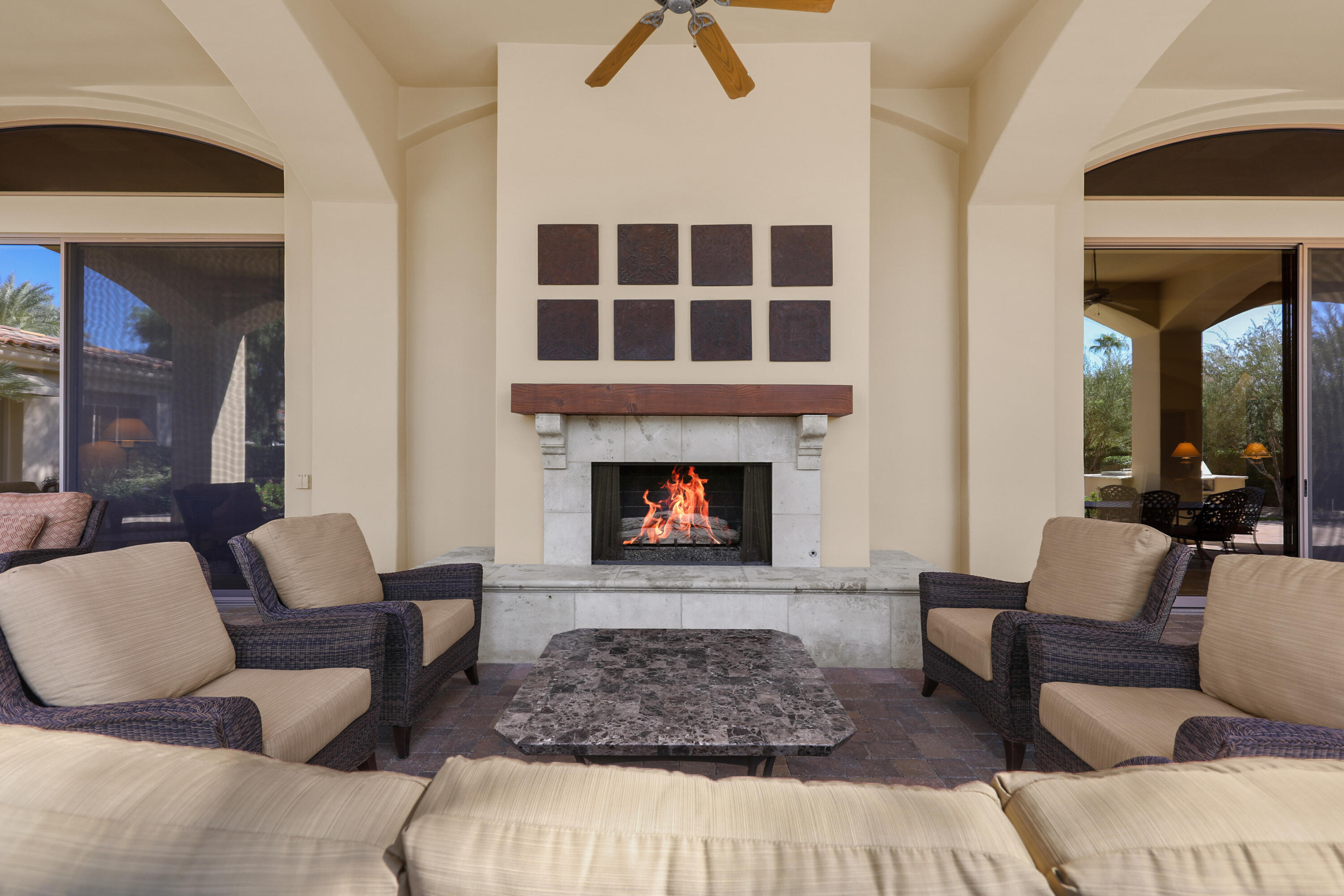 50360 Woodmere La Quinta, CA 92253 - Photo 38 of 56 a living room with furniture and a fireplace