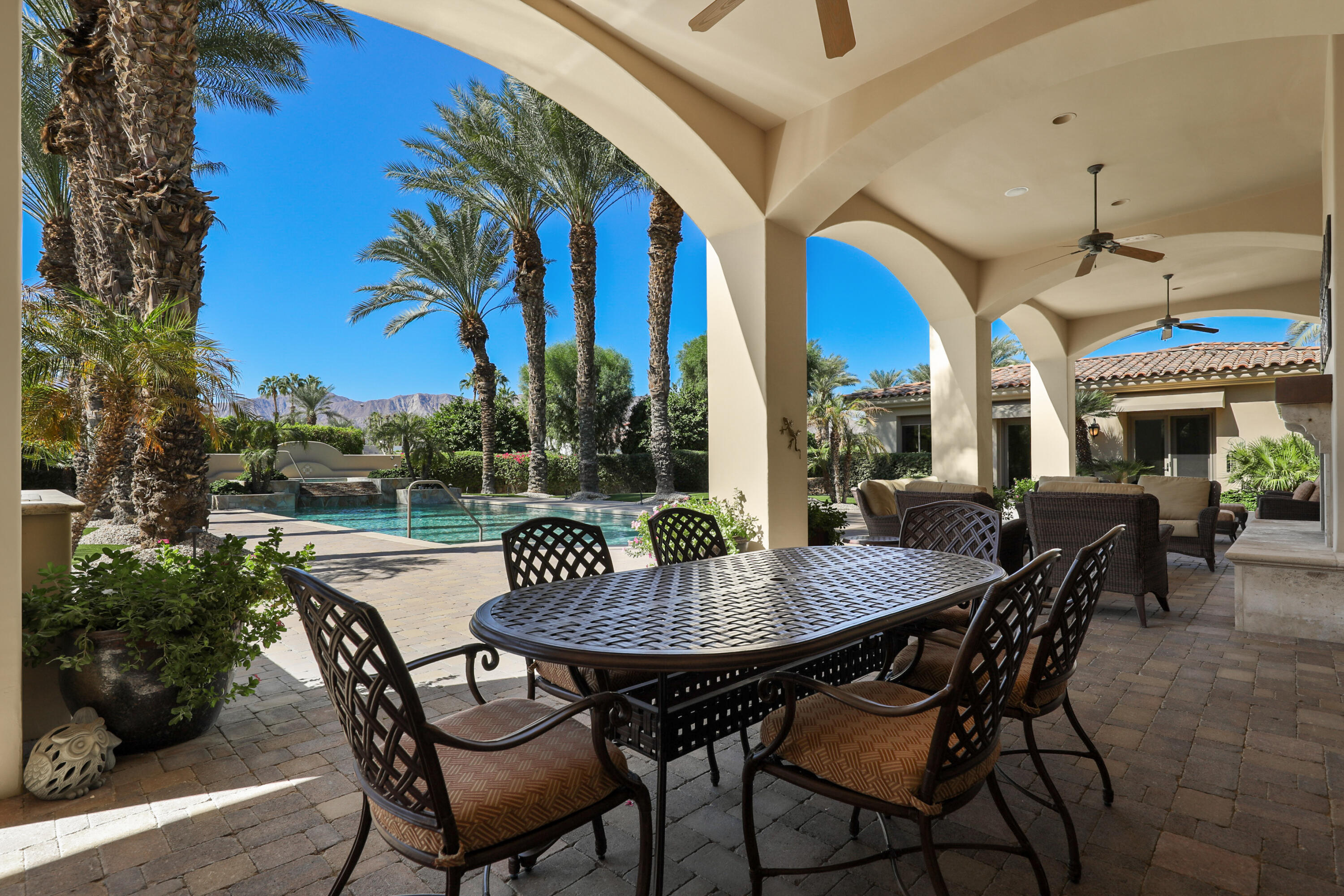 50360 Woodmere La Quinta, CA 92253 - Photo 41 of 56 a view of a patio with a table and chairs