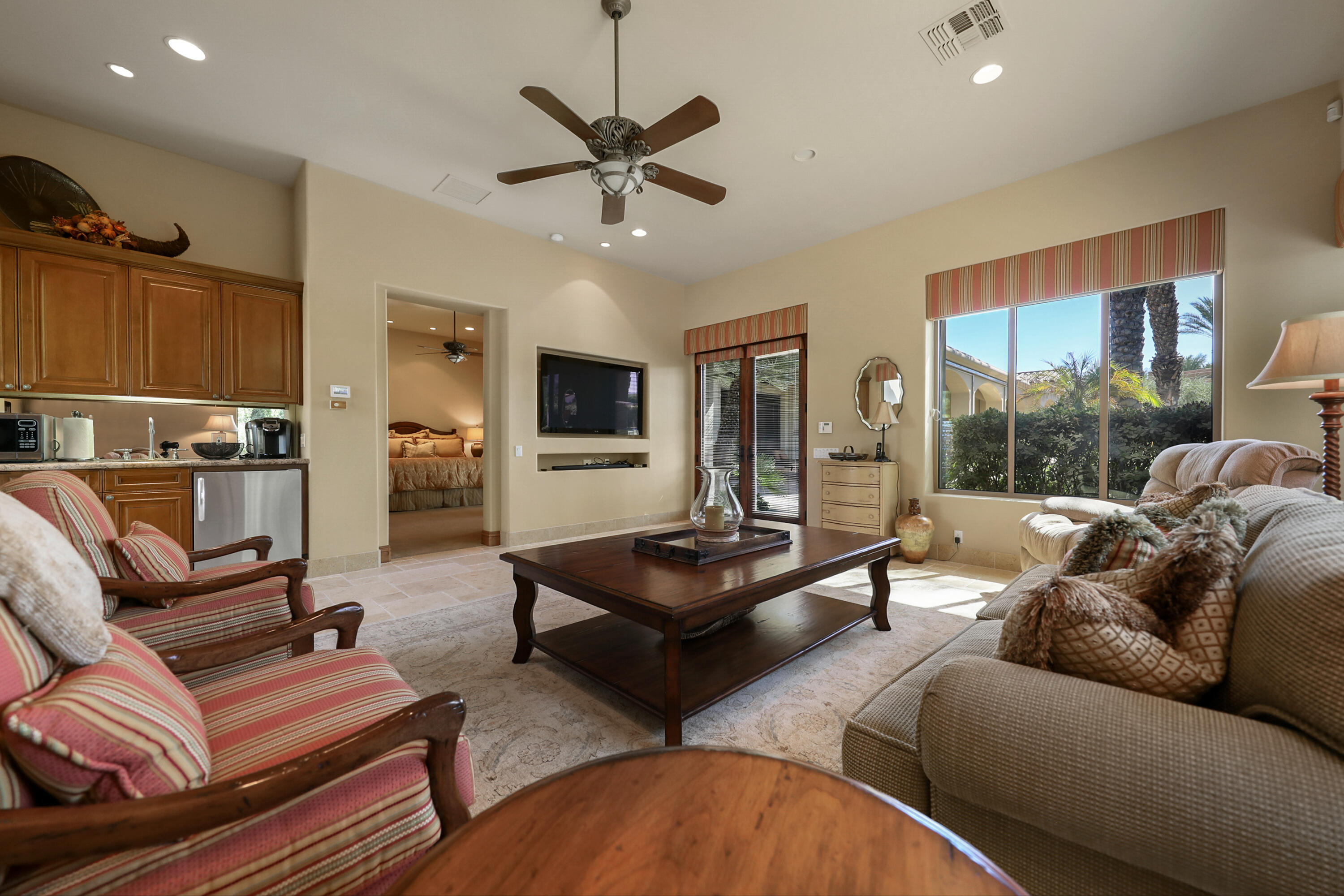 50360 Woodmere La Quinta, CA 92253 - Photo 47 of 56 a living room with furniture and a large window