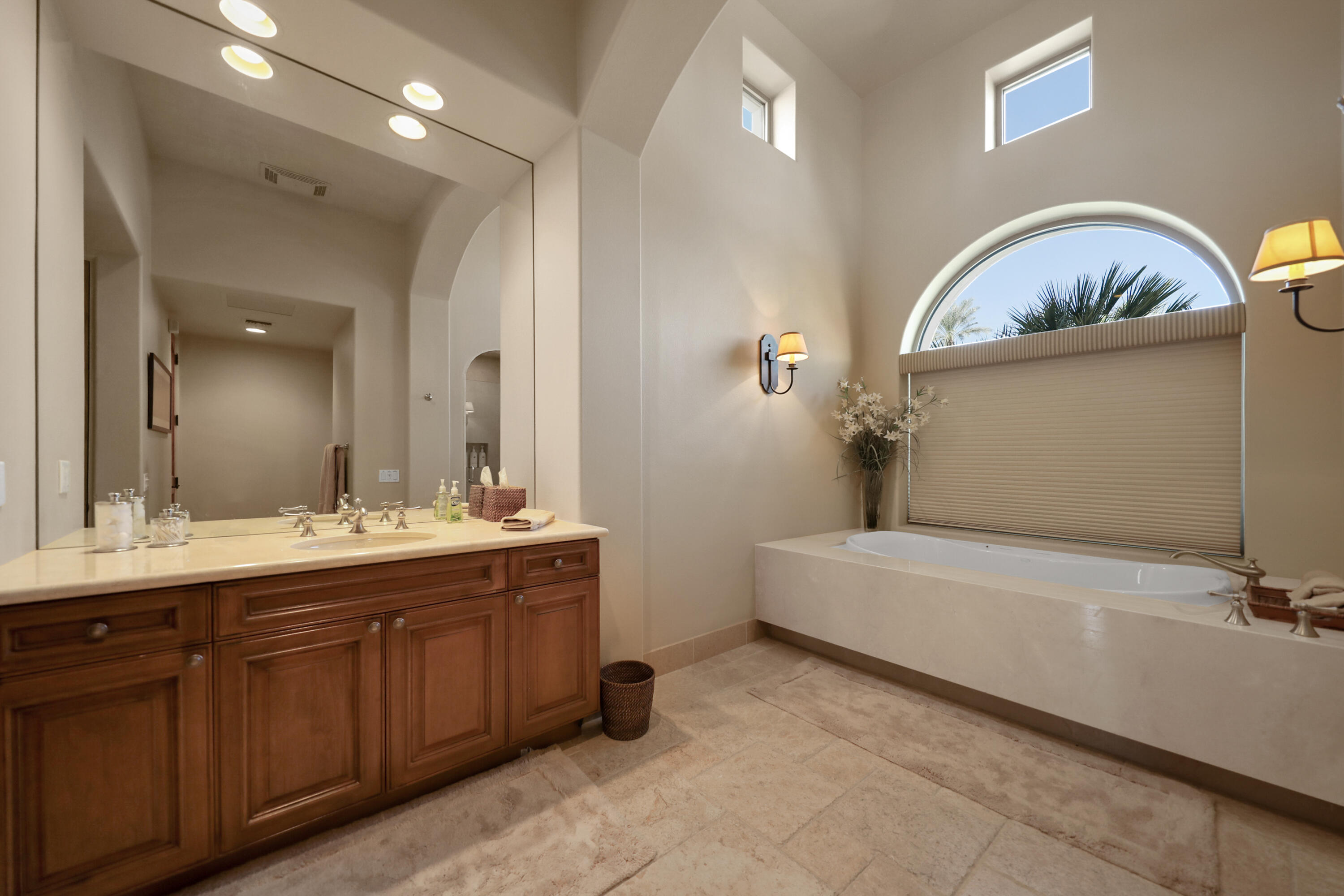 50360 Woodmere La Quinta, CA 92253 - Photo 51 of 56 a bathroom with a tub sink and mirror