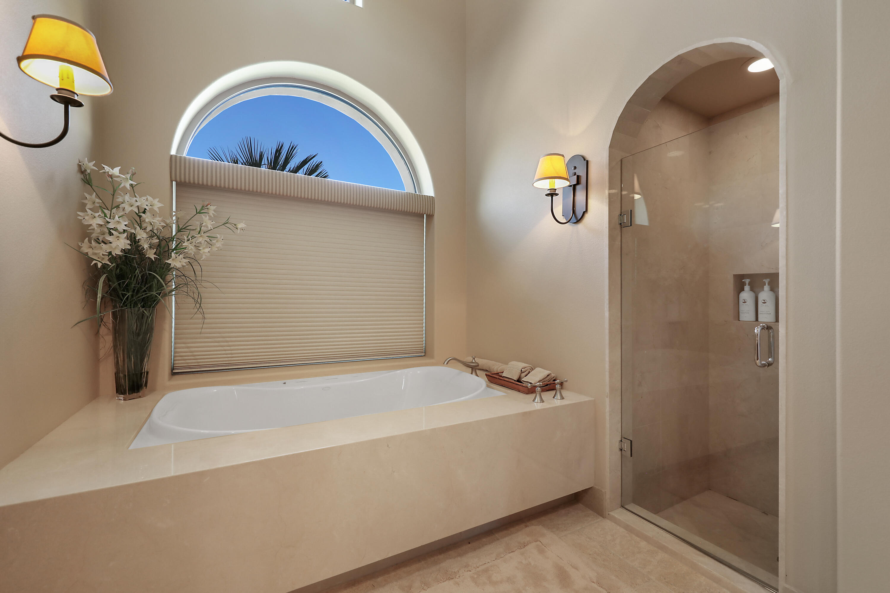 50360 Woodmere La Quinta, CA 92253 - Photo 52 of 56 a bathroom with a tub and a shower