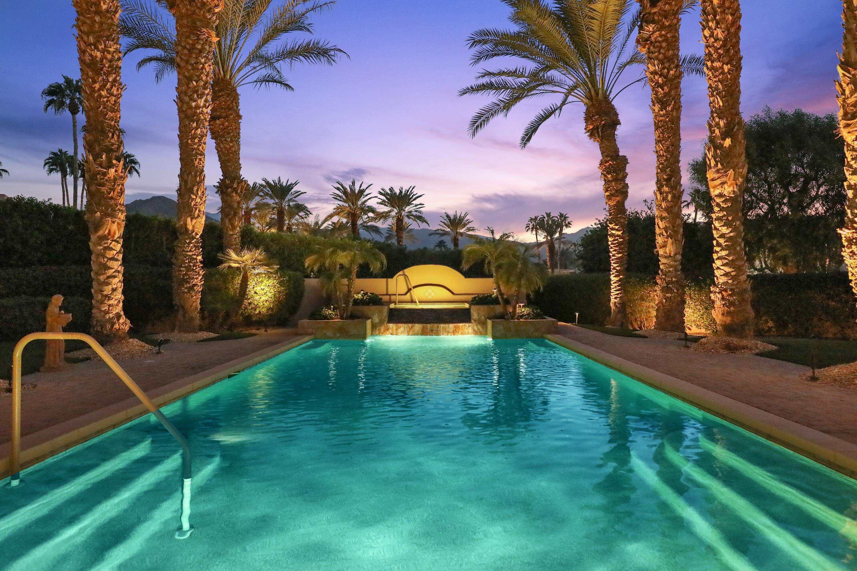 50360 Woodmere La Quinta, CA 92253 - Photo 6 of 56 a backyard of a house with lots of green space