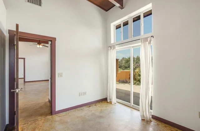 an empty room with windows