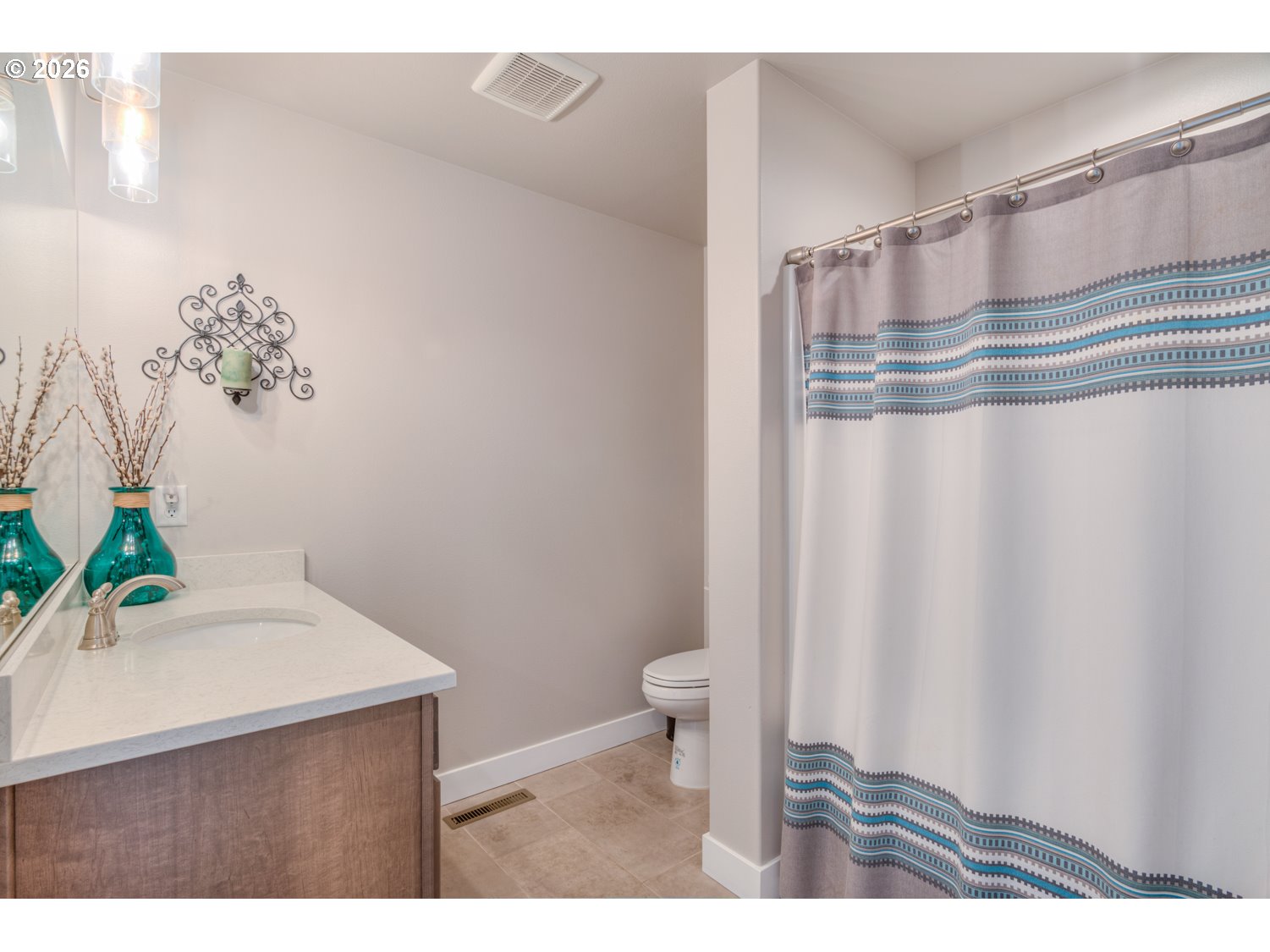 16732 Contorta Place La Pine, OR 97739 - Photo 13 of 48 a picture of a bathroom with a shower curtain