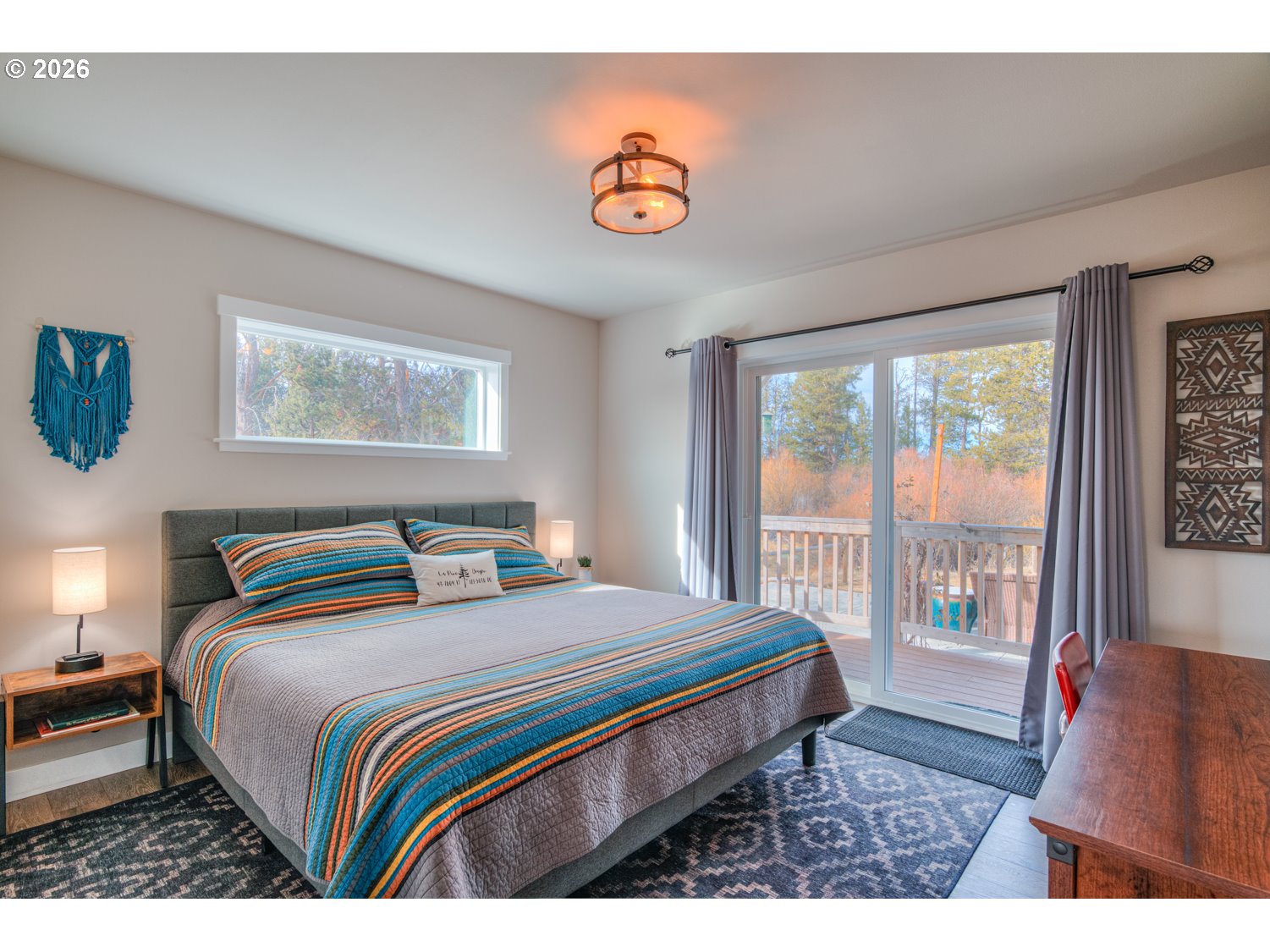 16732 Contorta Place La Pine, OR 97739 - Photo 15 of 48 a bedroom with a bed and a large window