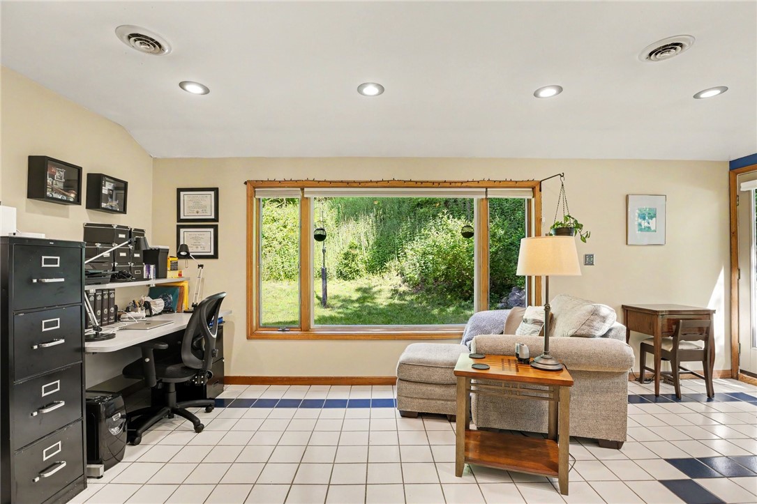 1722 Strong Road Victor, NY 14564 - Photo 9 of 33 Heated florida room, not included in sq.ft. with t