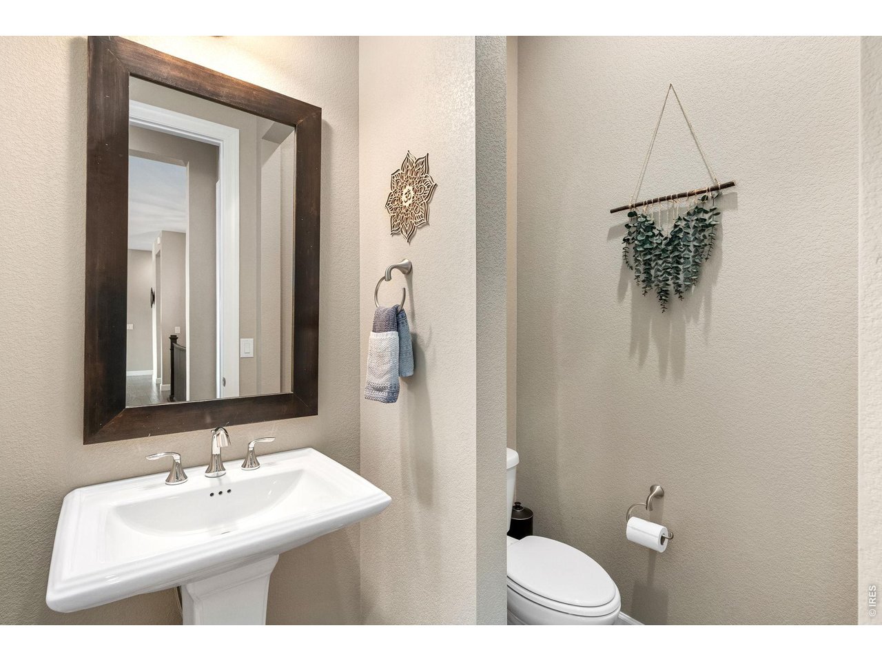 5879 Story Road Timnath, CO 80547 - Photo 18 of 49 Main floor powder bath