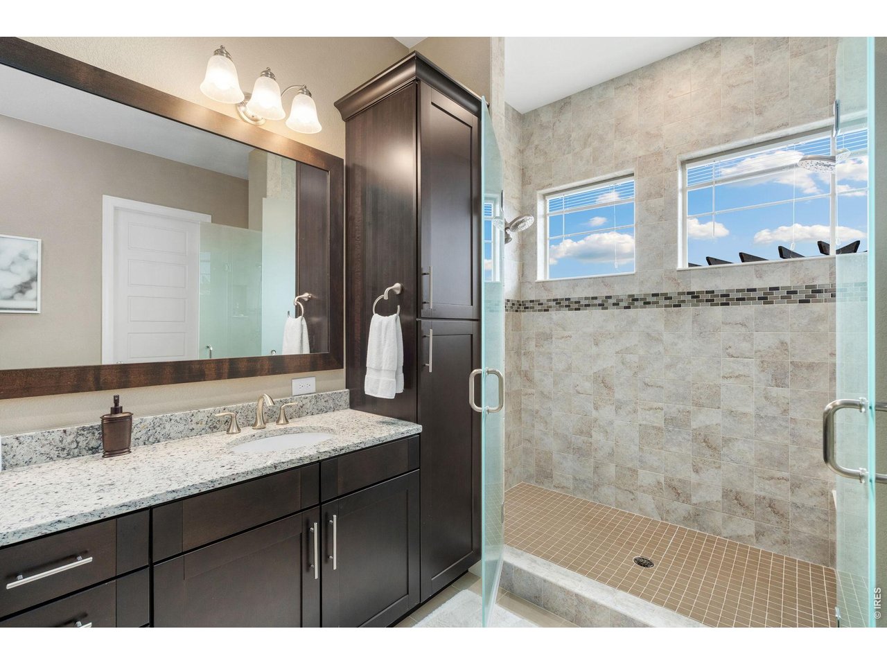 5879 Story Road Timnath, CO 80547 - Photo 21 of 49 Fully tiled primary shower with double glass doors