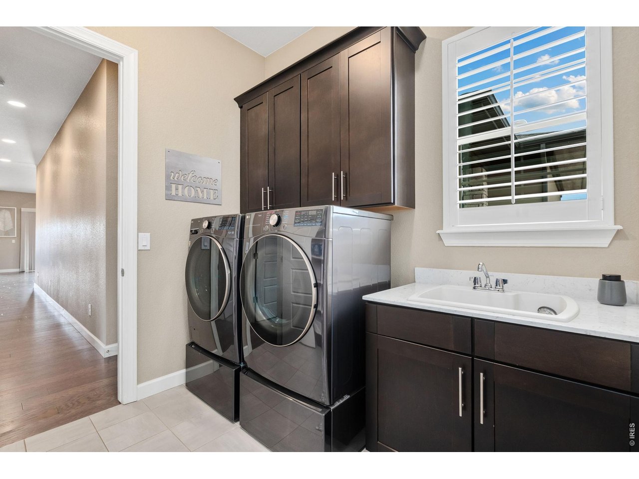 5879 Story Road Timnath, CO 80547 - Photo 27 of 49 Main level laundry; washer and dryer are included.