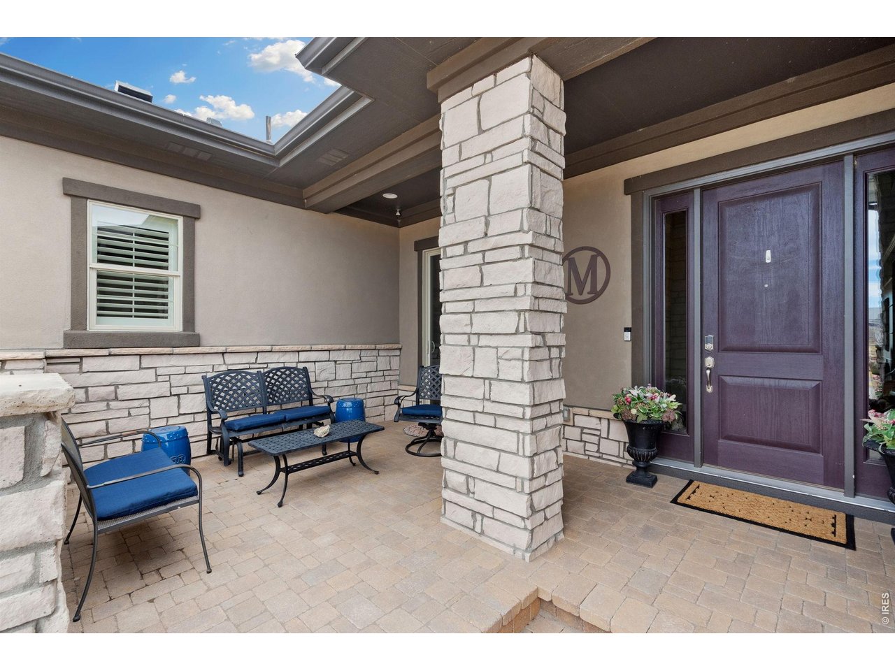 5879 Story Road Timnath, CO 80547 - Photo 3 of 49 Private paver front patio with easy access from dining area