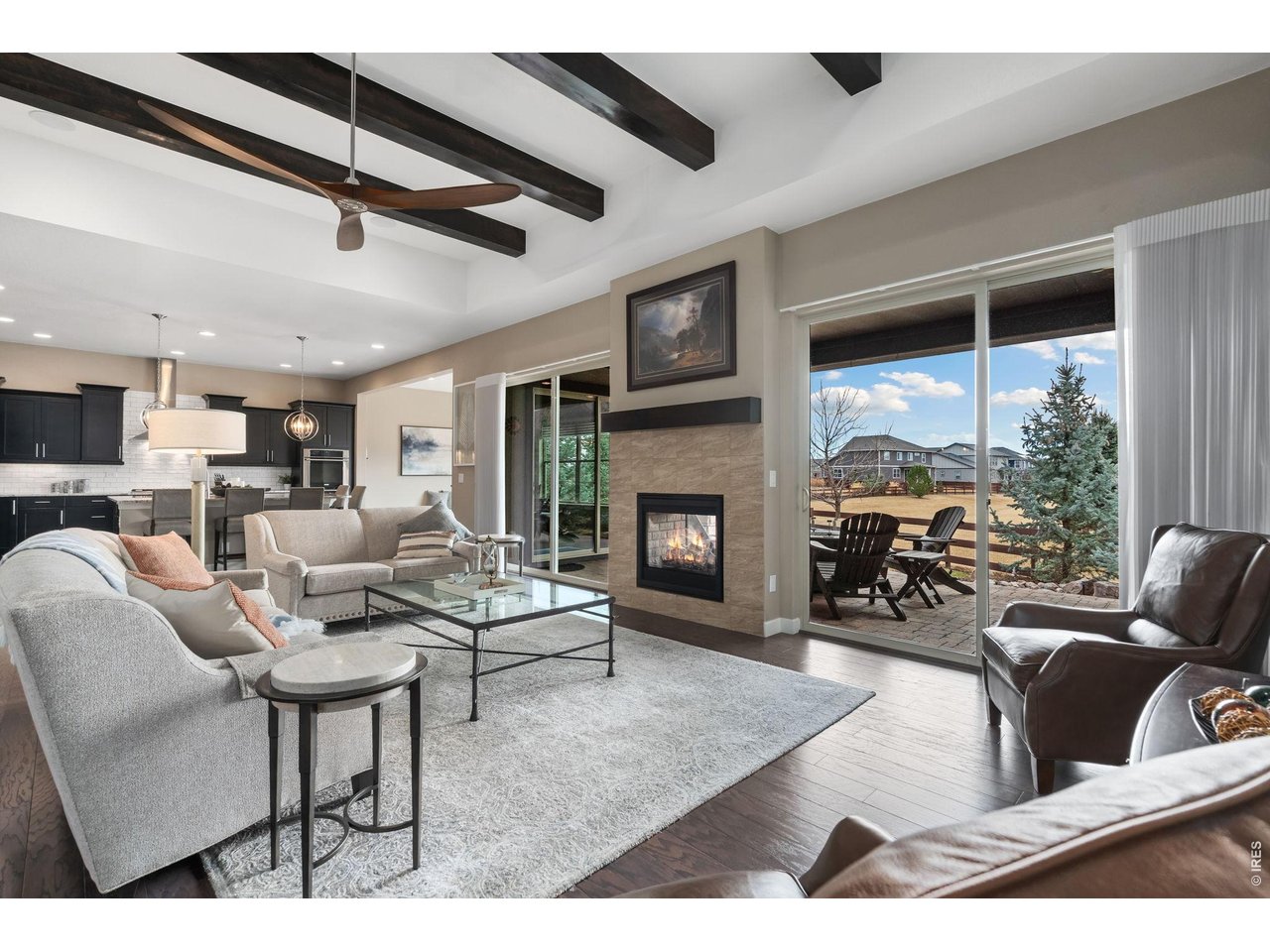 5879 Story Road Timnath, CO 80547 - Photo 8 of 49 Large great room with beamed ceilings