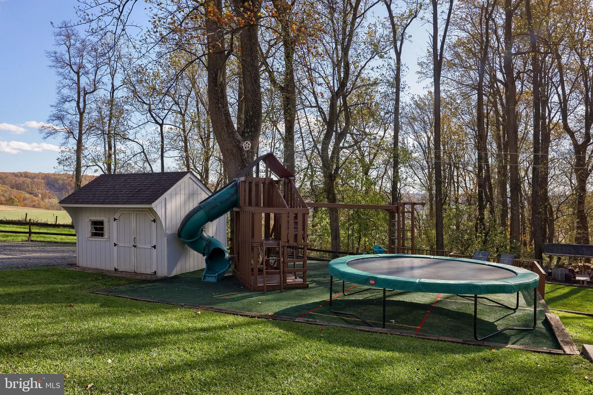 339 Churchtown Road Narvon, PA 17555 - Photo 5 of 98 a backyard of a house with table and chairs