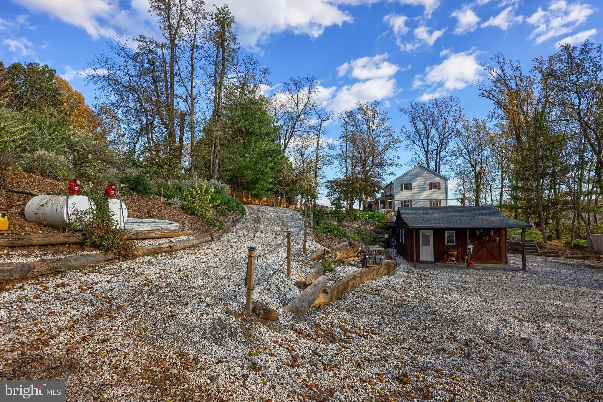 339 Churchtown Road Narvon, PA 17555 - Photo 7 of 98 a view of a backyard with a table and chairs