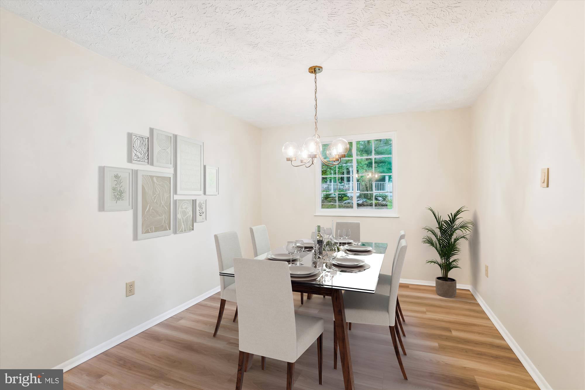1221 Windmill Lane Silver Spring, MD 20905 - Photo 2 of 38 a view of a dining room with furniture window and wooden floor