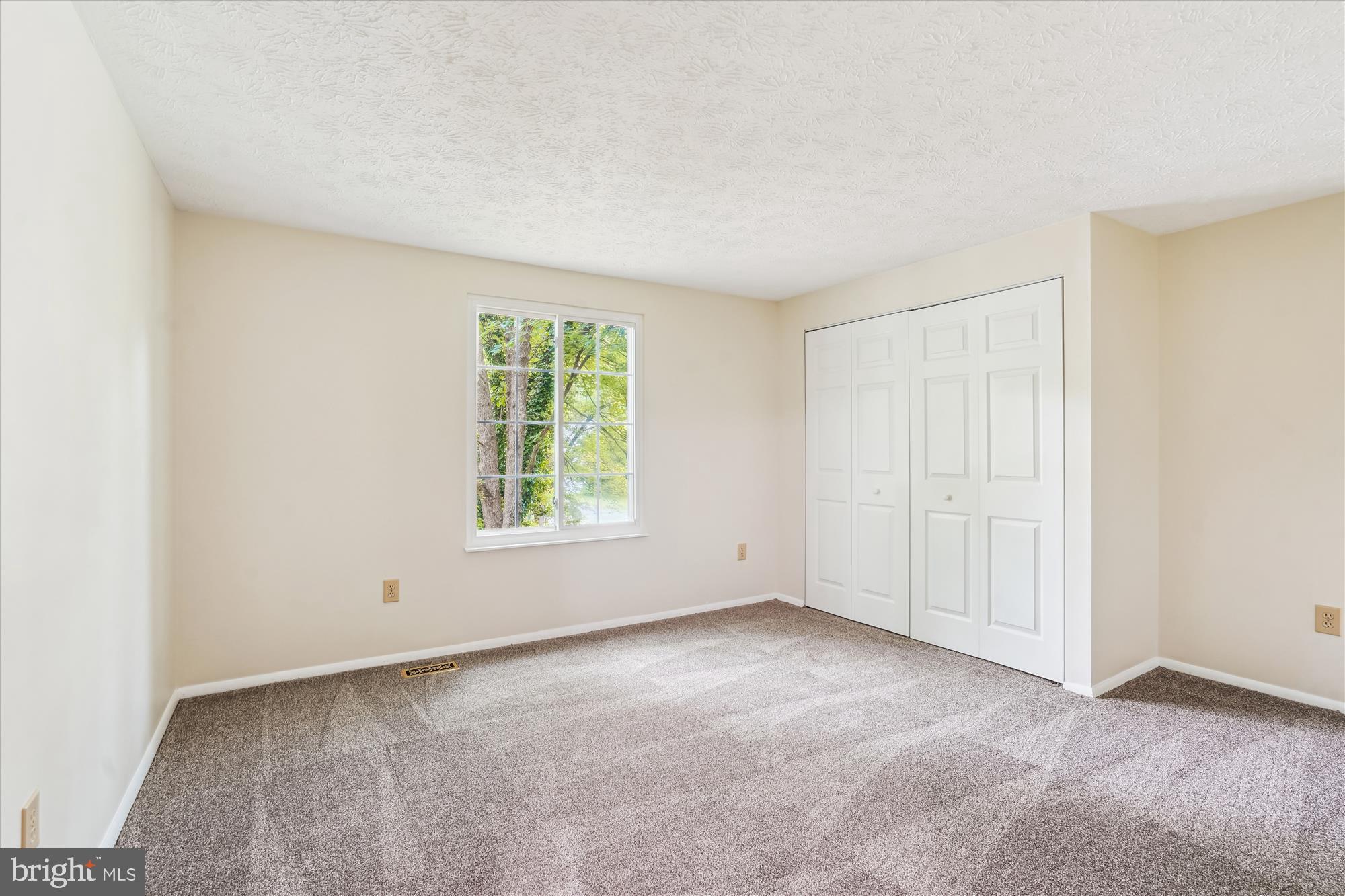 1221 Windmill Lane Silver Spring, MD 20905 - Photo 21 of 38 an empty room with windows
