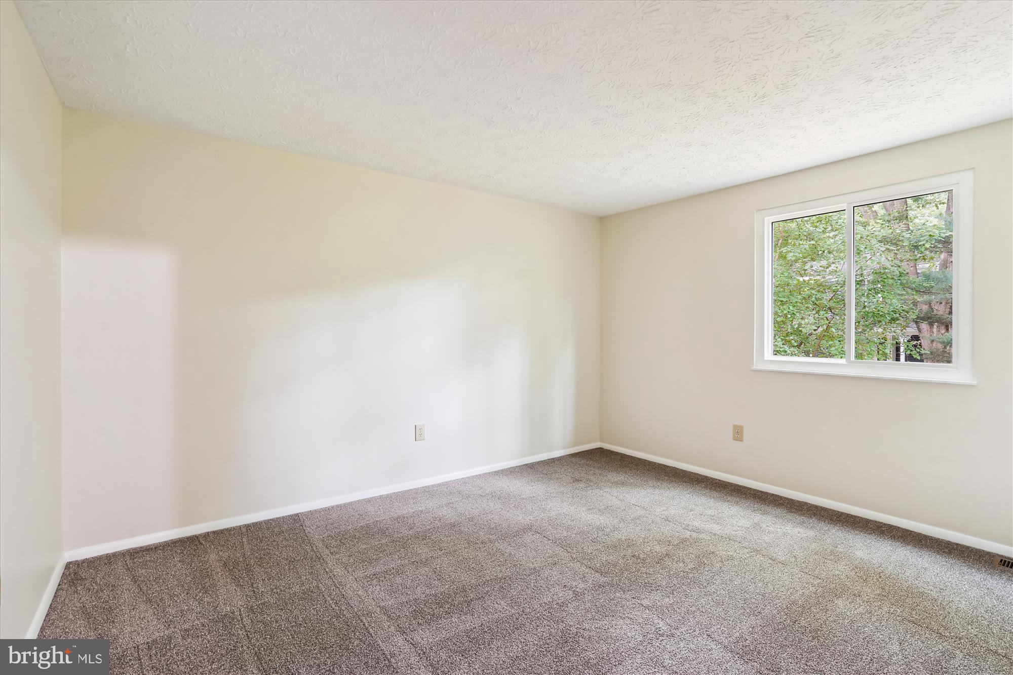 1221 Windmill Lane Silver Spring, MD 20905 - Photo 23 of 38 an empty room with a window