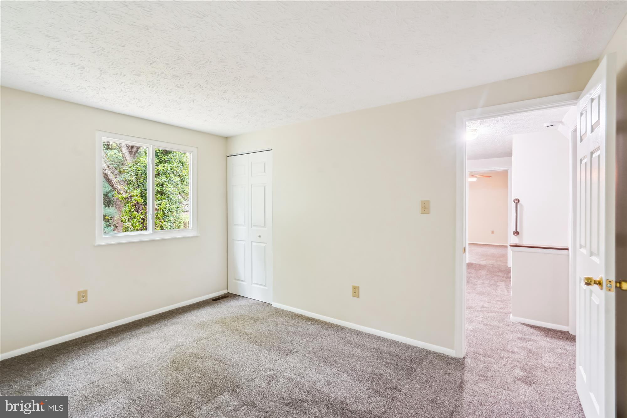1221 Windmill Lane Silver Spring, MD 20905 - Photo 24 of 38 a view of an empty room with a window