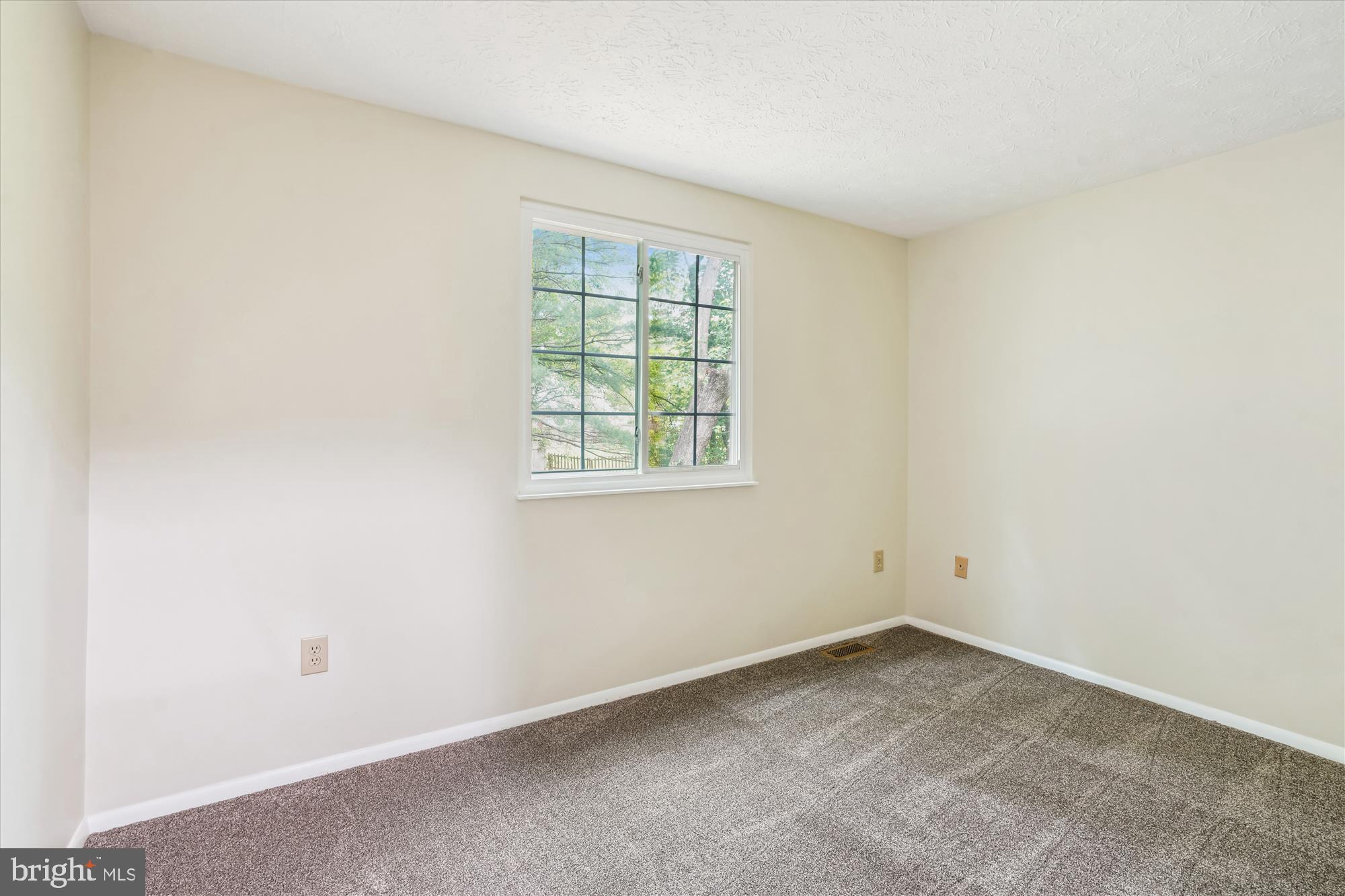 1221 Windmill Lane Silver Spring, MD 20905 - Photo 25 of 38 an empty room with a window