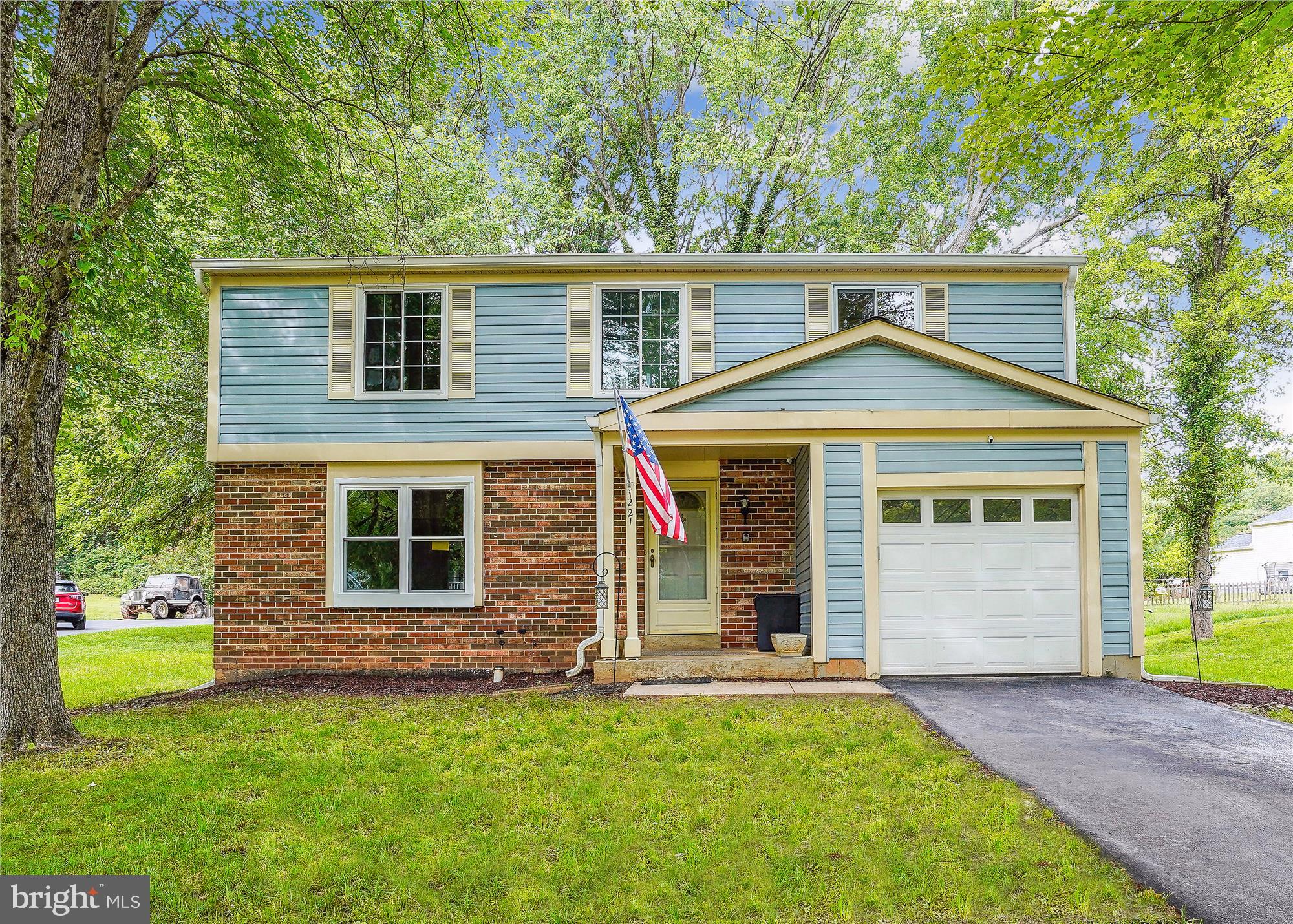 1221 Windmill Lane Silver Spring, MD 20905 - Photo 29 of 38 front view of a house and a yard