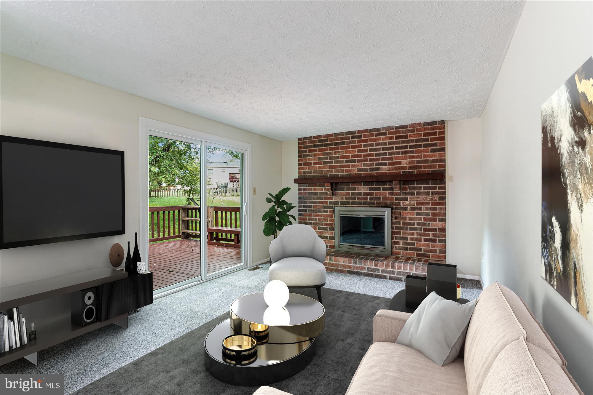 1221 Windmill Lane Silver Spring, MD 20905 - Photo 3 of 38 a living room with furniture and a flat screen tv
