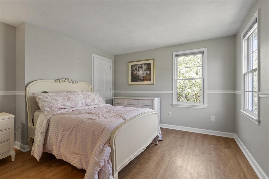 4 Ridge Road Pepperell, MA 01463 - Photo 26 of 42 a bedroom with a bed and a window