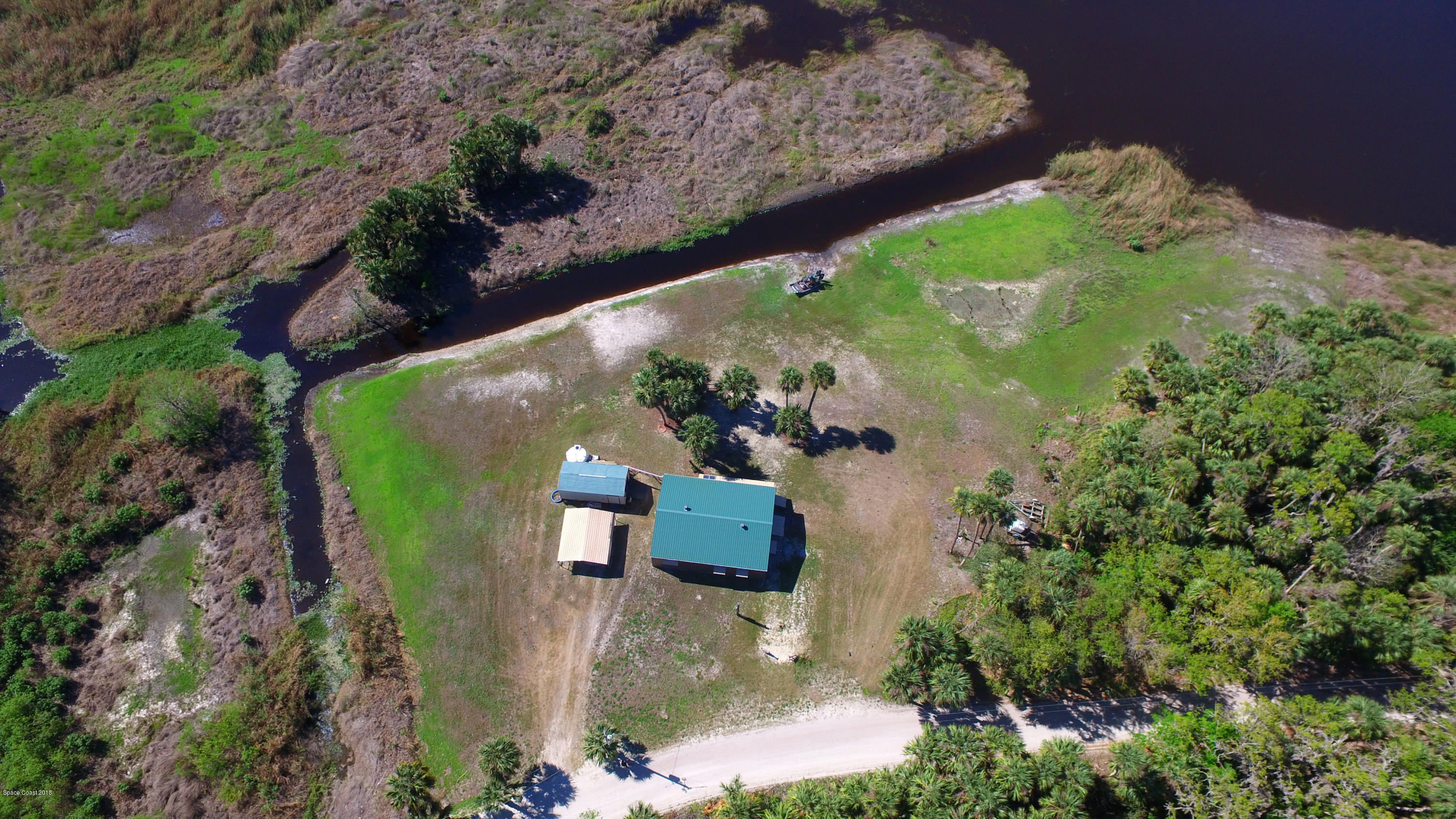 8119 Baxter Point Road Mims, FL 32754 - Photo 1 of 25 DJI_0100