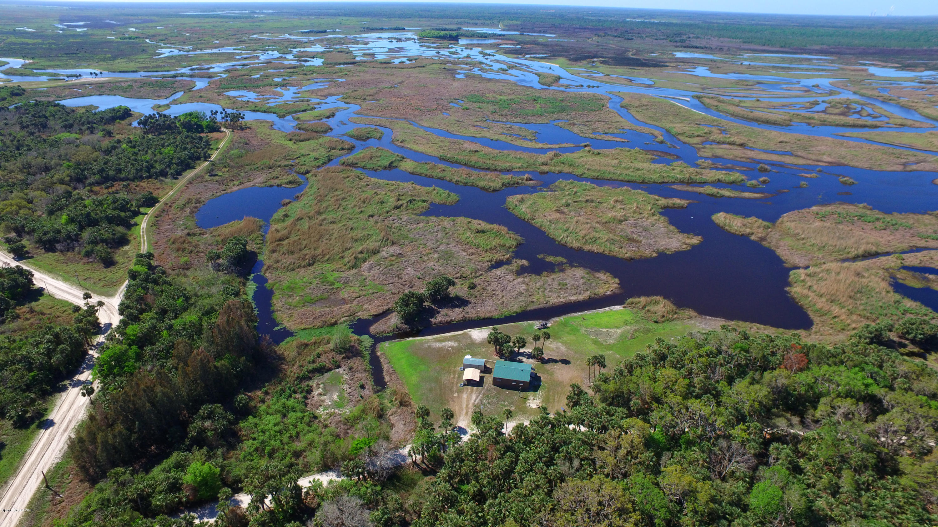 8119 Baxter Point Road Mims, FL 32754 - Photo 2 of 25 DJI_0101