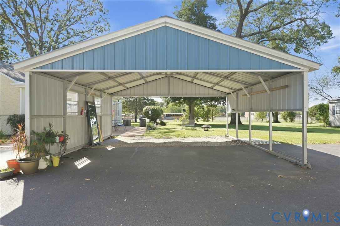 2406 McRae Road Richmond, VA 23235 - Photo 28 of 40 The metal two car carport offers convenient covere