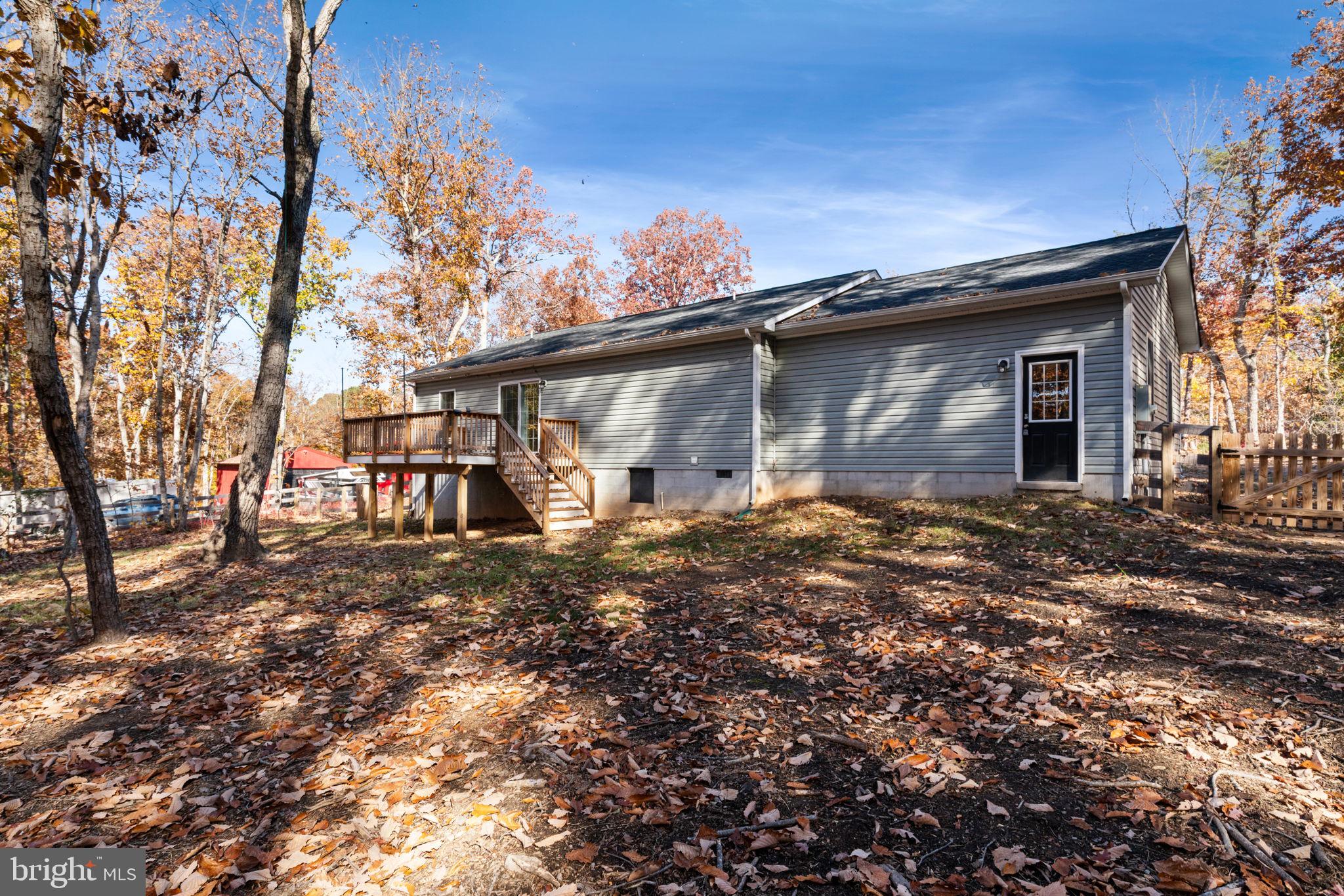 55 Cedar Circle Mineral, VA 23117 - Photo 10 of 44 a front view of a house with garden