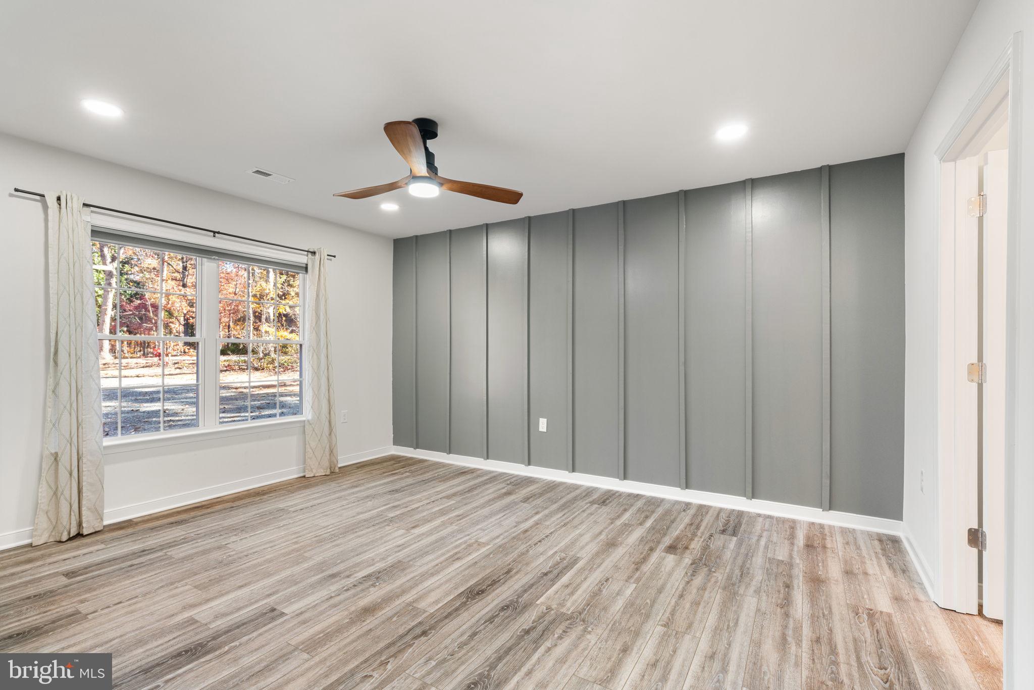 55 Cedar Circle Mineral, VA 23117 - Photo 24 of 44 a view of an empty room with wooden floor and a window