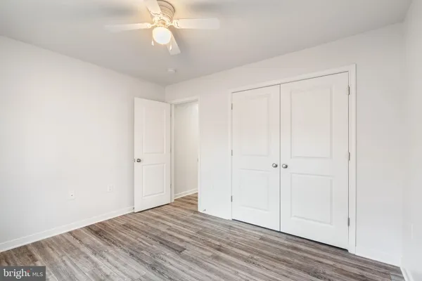 a view of a room with racks on the wall