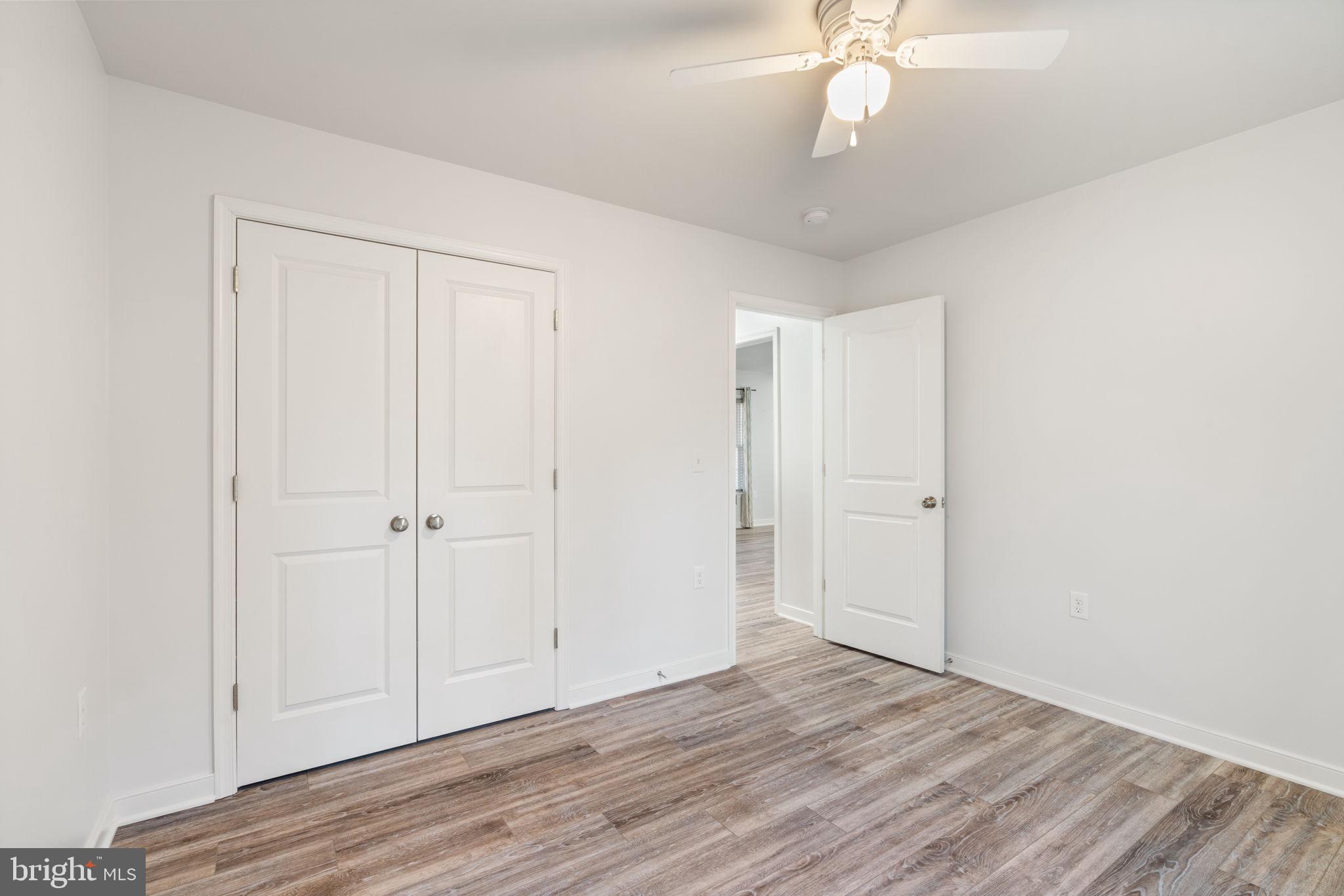 55 Cedar Circle Mineral, VA 23117 - Photo 30 of 44 a view of an empty room with wooden floor