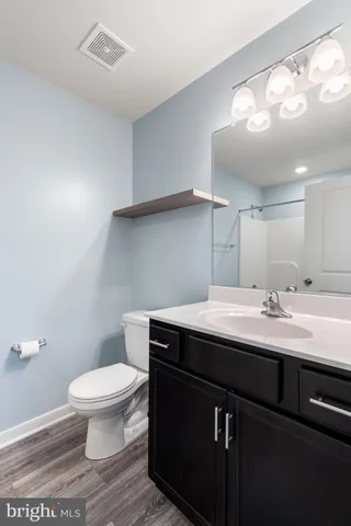 a view of a room with storage and utility room