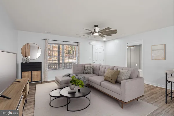 a kitchen with stainless steel appliances granite countertop a sink stove and microwave