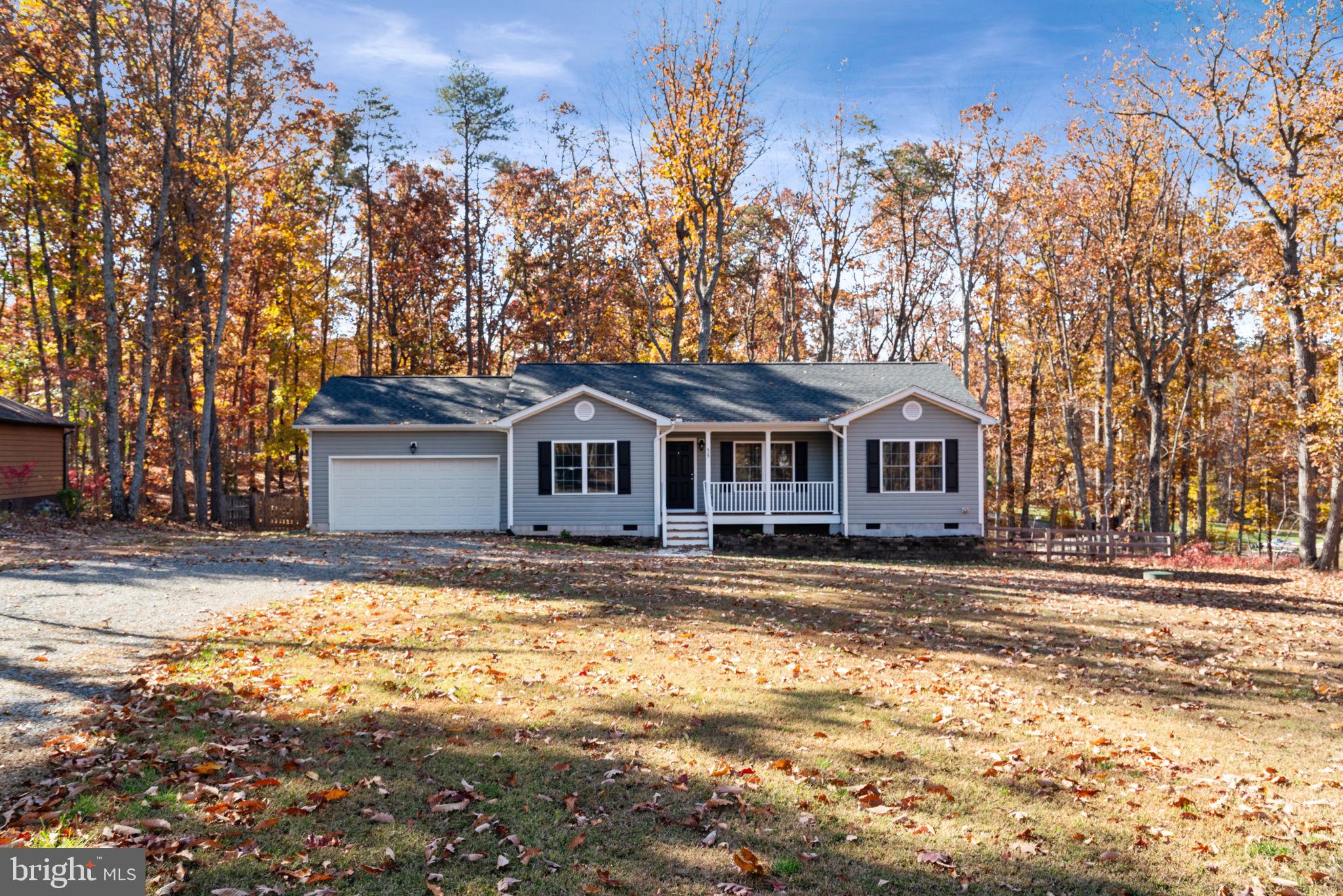 55 Cedar Circle Mineral, VA 23117 - Photo 40 of 44 a front view of a house with a yard
