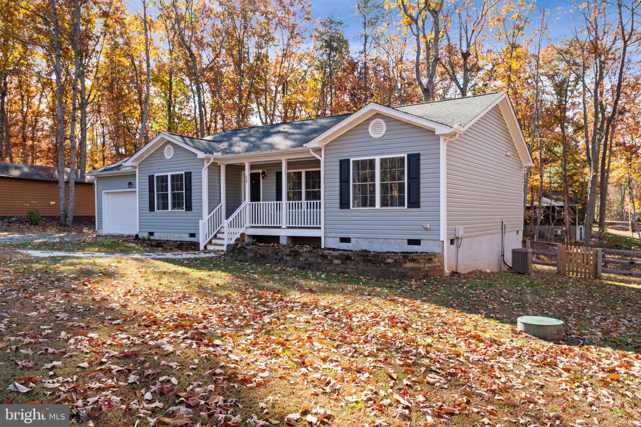 55 Cedar Circle Mineral, VA 23117 - Photo 41 of 44 a front view of a house with a yard