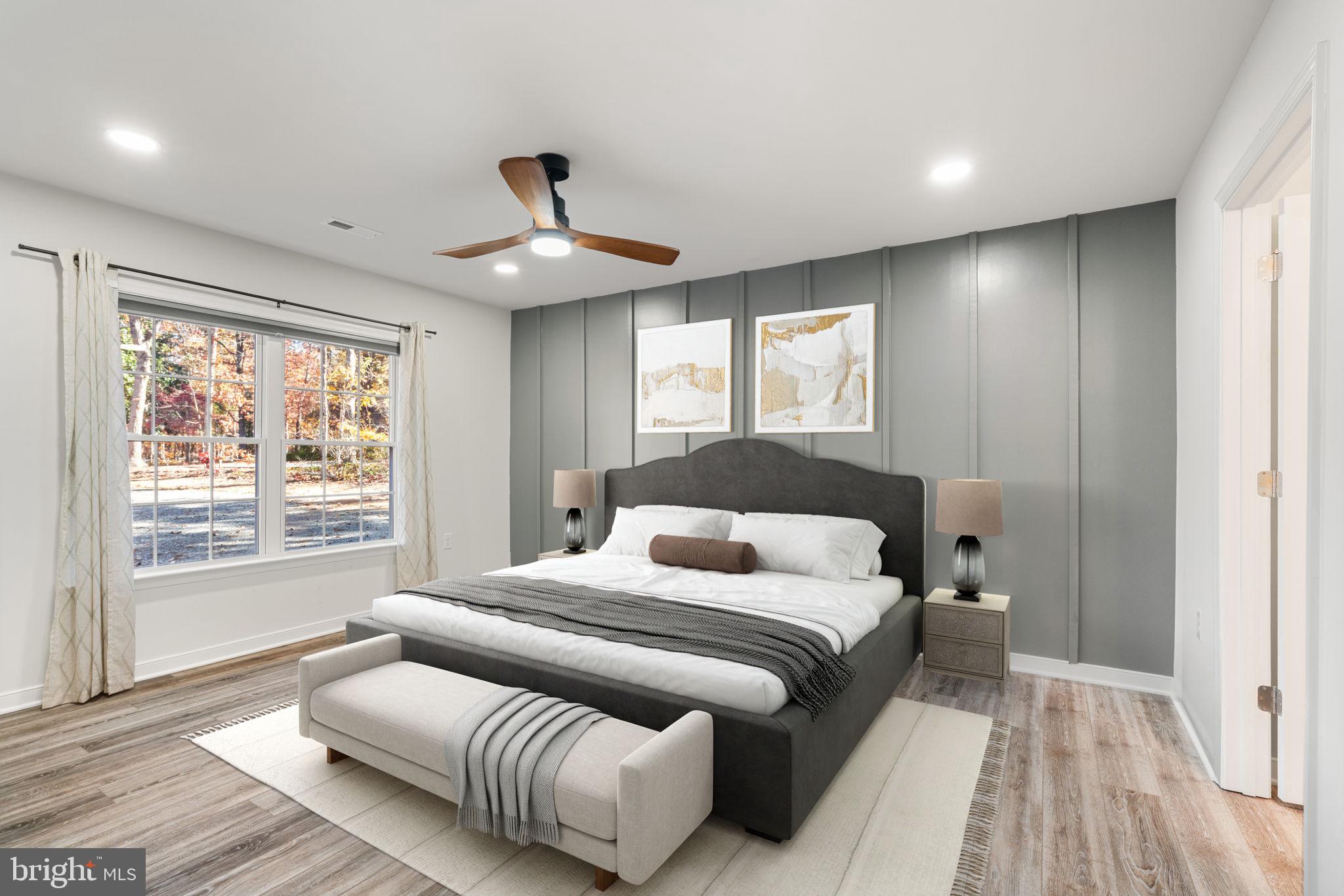 55 Cedar Circle Mineral, VA 23117 - Photo 5 of 44 a bedroom with a large bed and a window