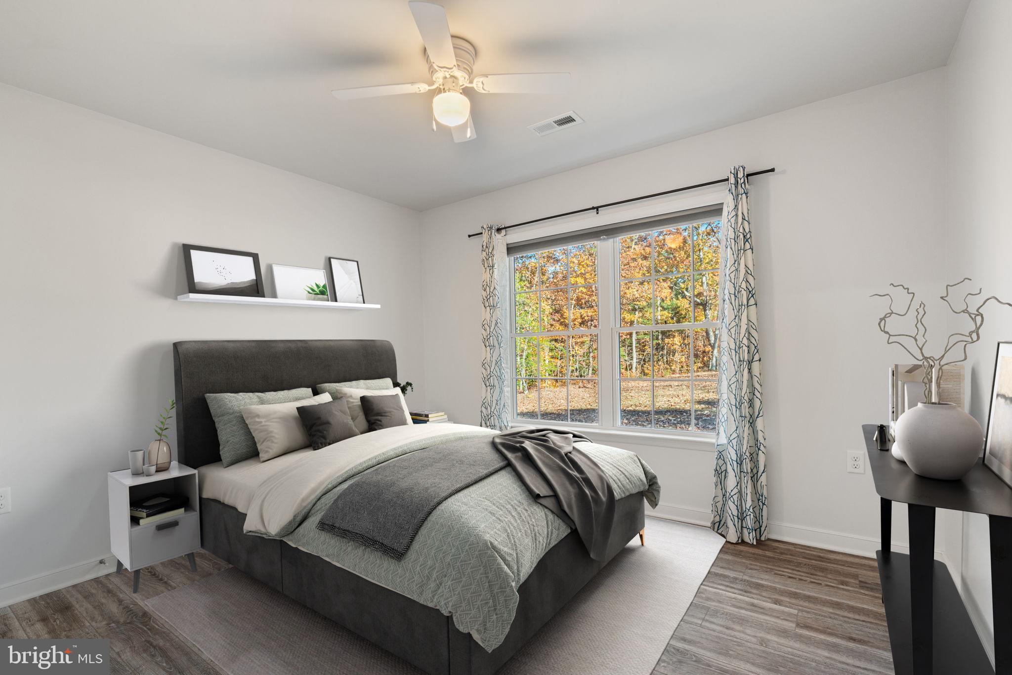 55 Cedar Circle Mineral, VA 23117 - Photo 7 of 44 a bedroom with a bed and a window