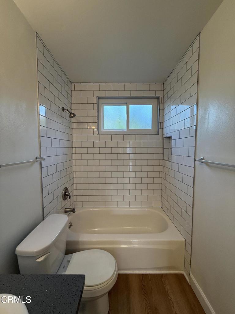 1171 Meta Street, Unit 16 Ventura, CA 93001 - Photo 12 of 15 a bathroom with a toilet and bathtub