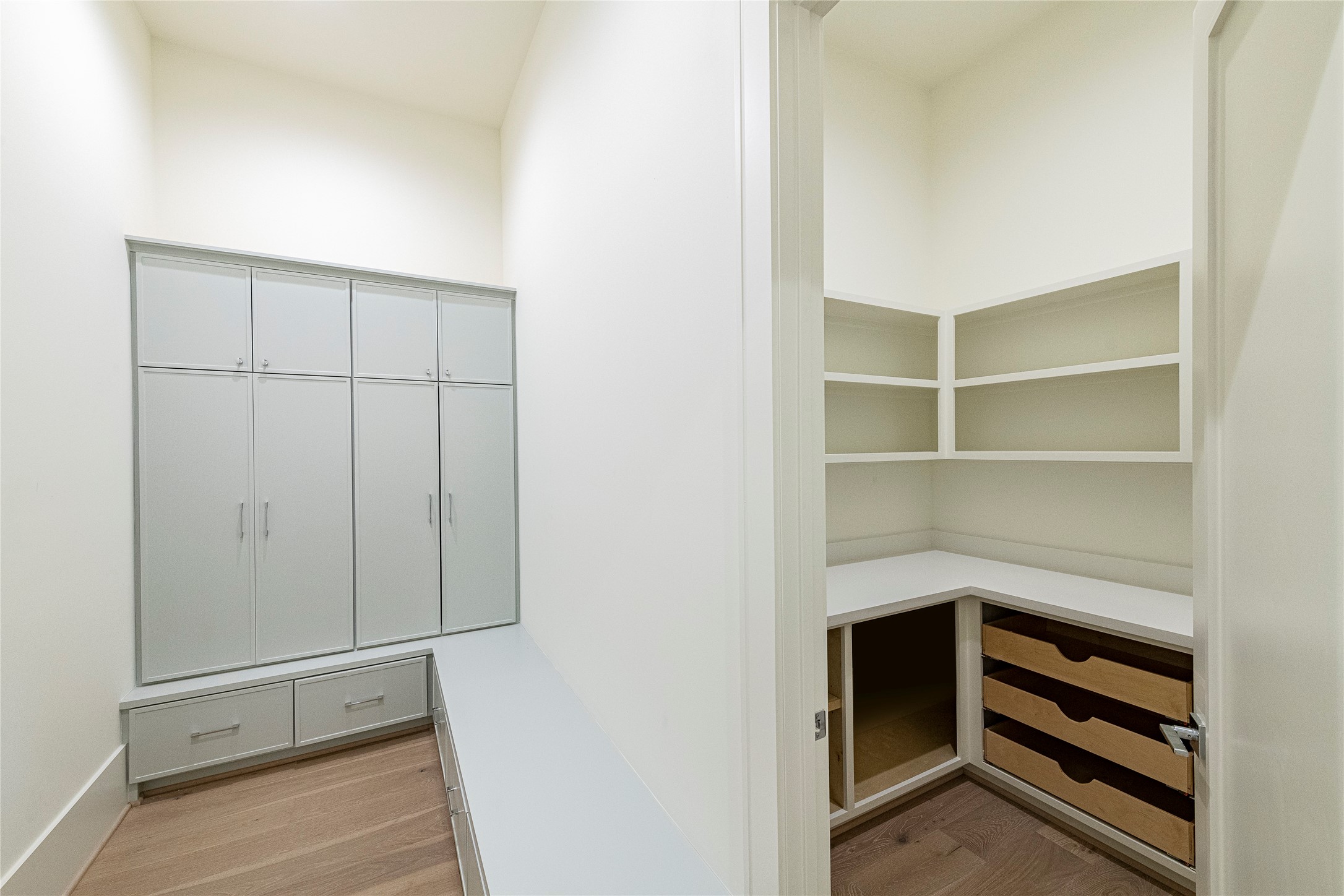 1407 Martin Street Houston, TX 77018 - Photo 11 of 34 a view of walk in closet with empty racks