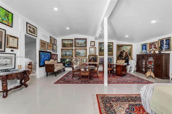 a living room with furniture or couch and a flat screen tv