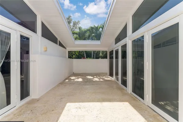 a view of backyard of the house